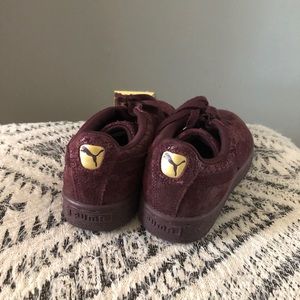 Dark purple puma sneakers
